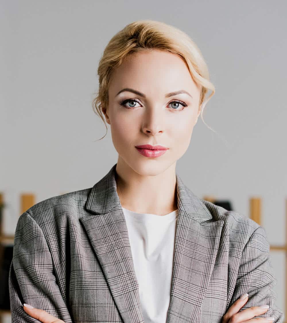 confident-businesswoman-standing-at-office-2023-11-27-05-05-19-utc