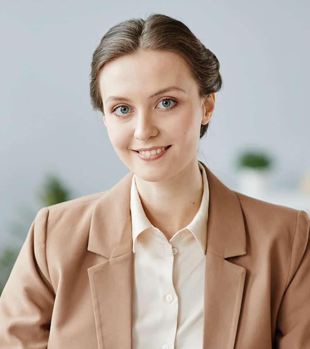 portrait-of-young-businesswoman-at-workplace-2023-11-27-05-29-50-utc.jpg